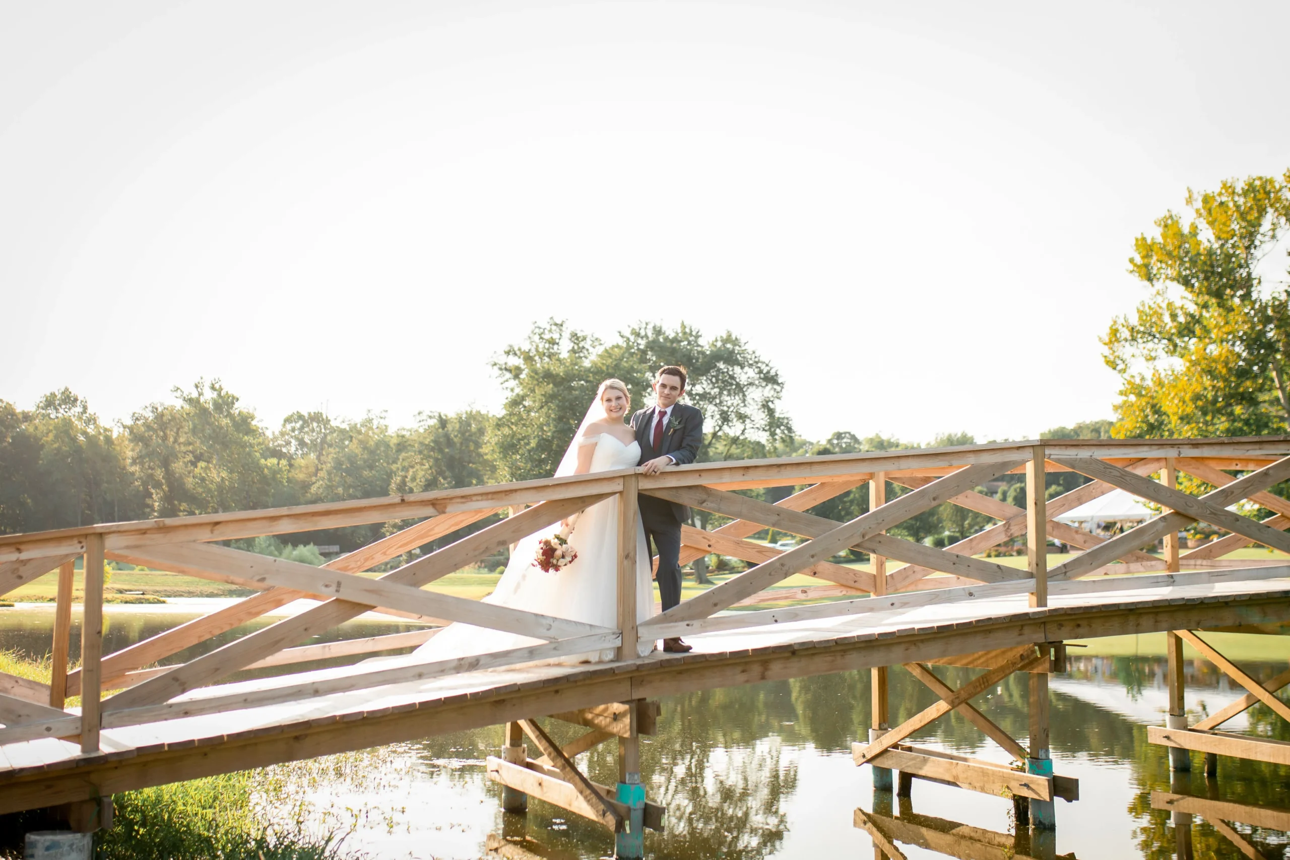 Wedding portraits by the water at Villa Antonio Winery